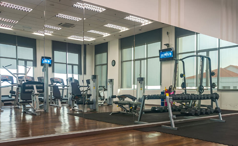wall of commercial mirrors in a gym